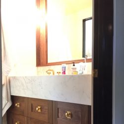 brown cabinets in bathroom